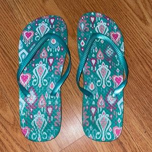Women’s turquoise and pink flip flops size US 7-8
